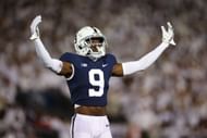 Joey Porter Jr. #9 of the Penn State Nittany Lions celebrates after a play against the Minnesota Golden Gophers